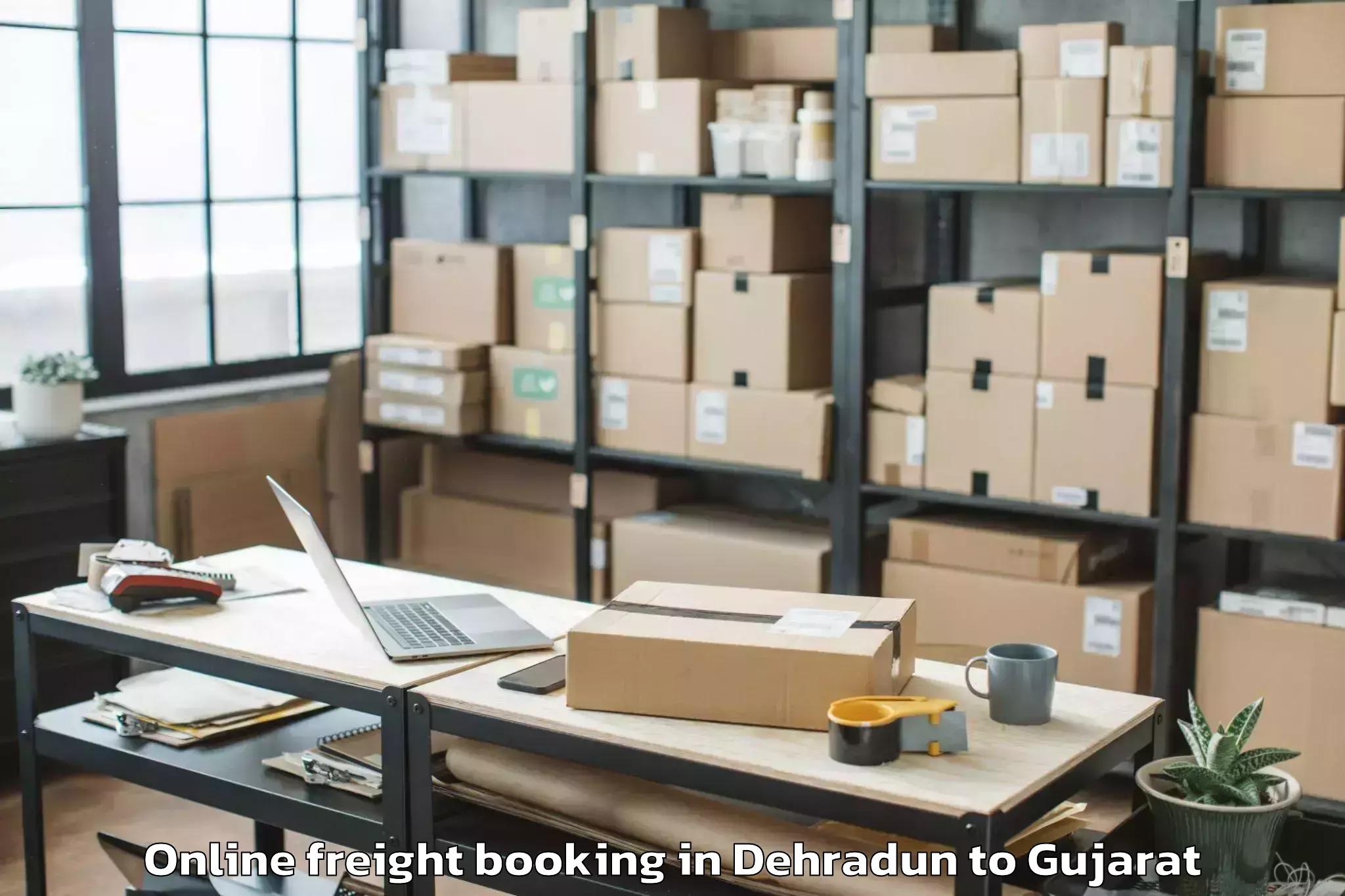 Affordable Dehradun to Kapadvanj Online Freight Booking